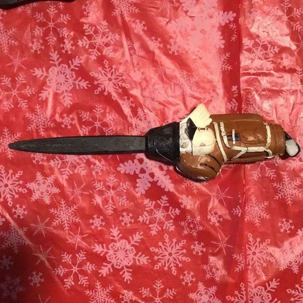 Letter opener with golf bag handle